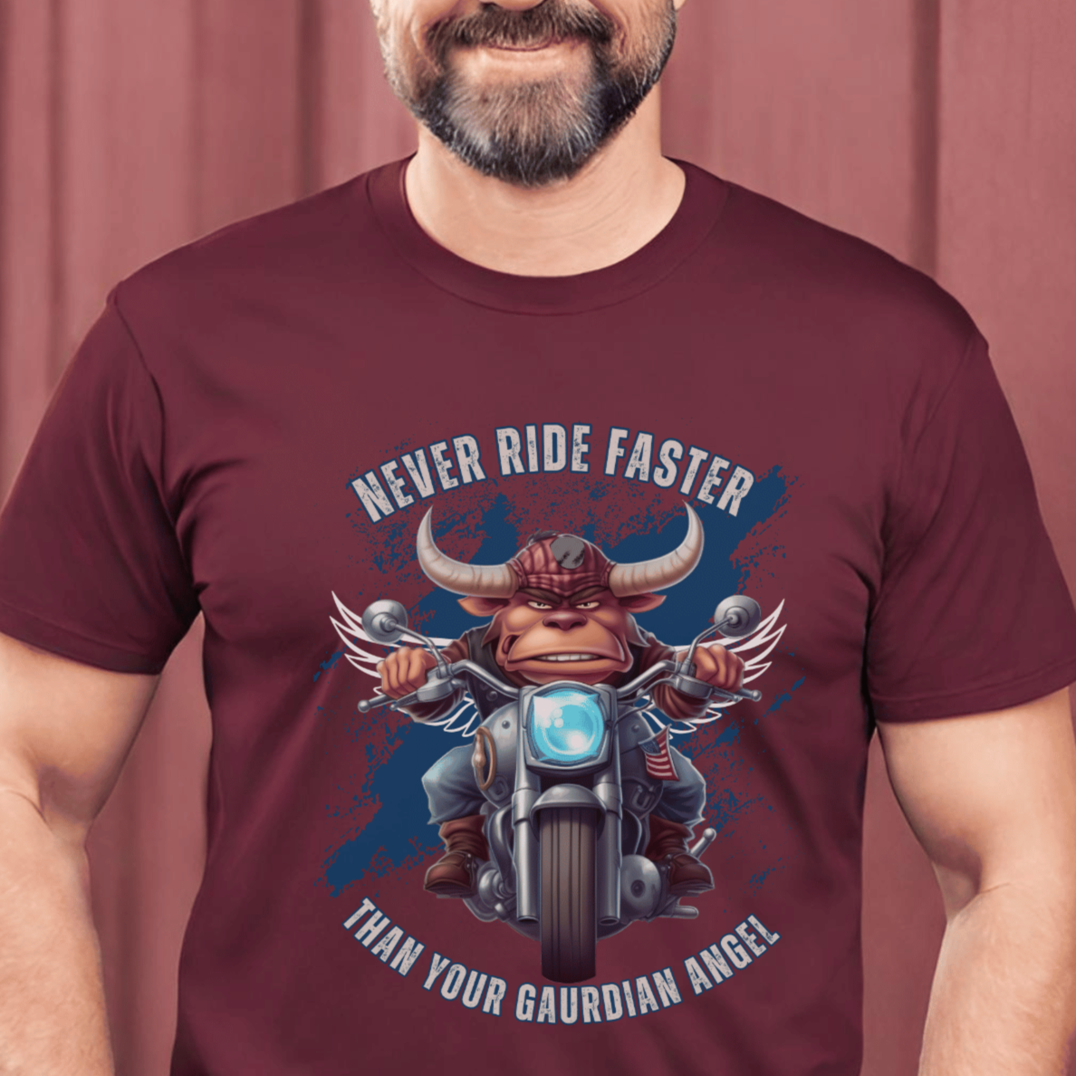 Biker t-shirt with a  bull with angel wings  riding a motorcyle ,with the saying Never Ride Faster Than Your Gaurdian Angel on a t-shirt.