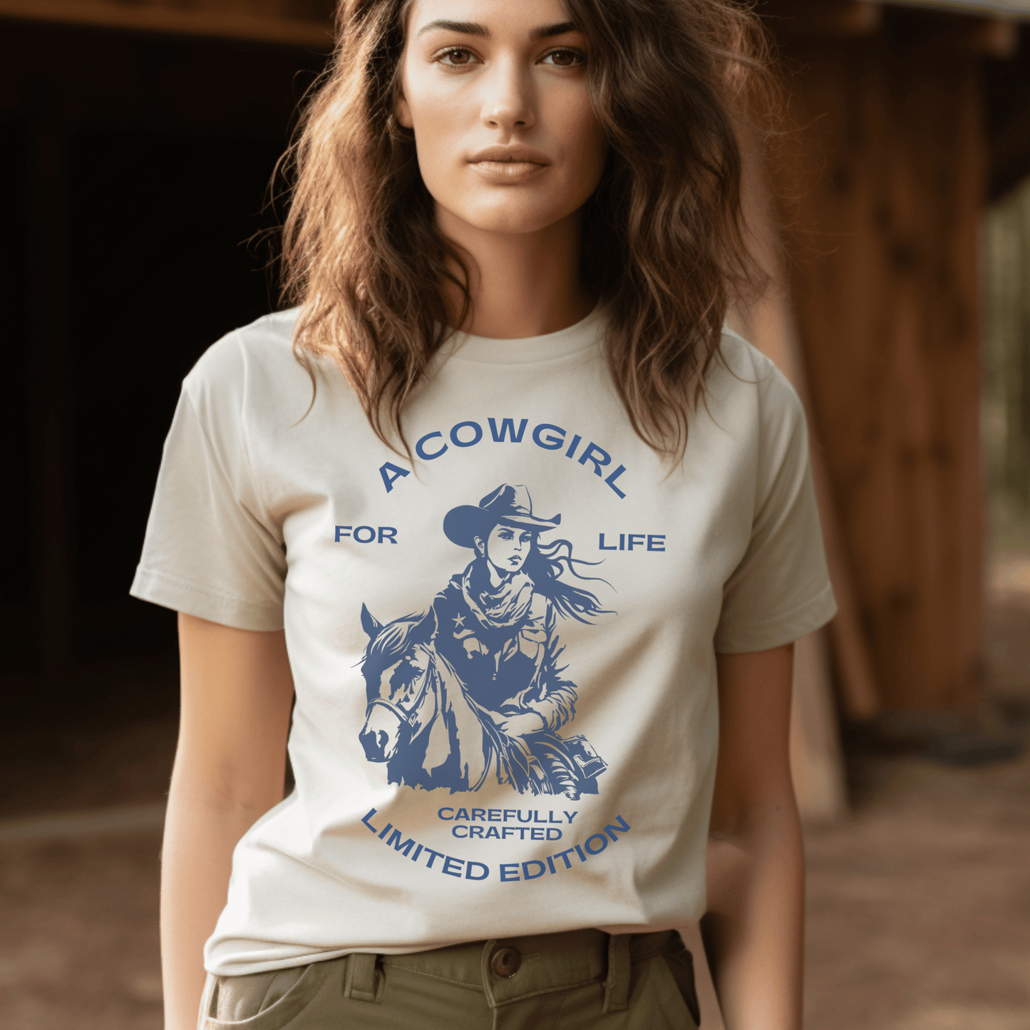 versatile tee features a bold and empowering statement that showcases your love for the cowgirl lifestyle. Whether you're out on the ranch, riding your favorite horse, or simply rocking a casual yet chic look, this t-shirt is a must-have addition to your wardrobe