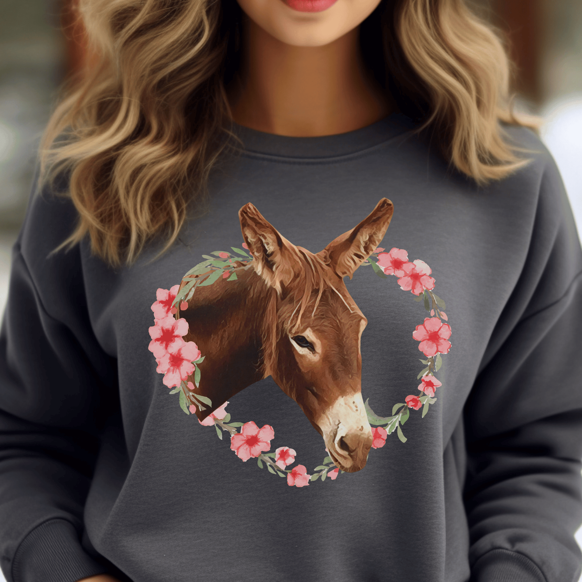 Crew neck sweatshirt with a cute donkey  surrounded by a pink flower wreath.