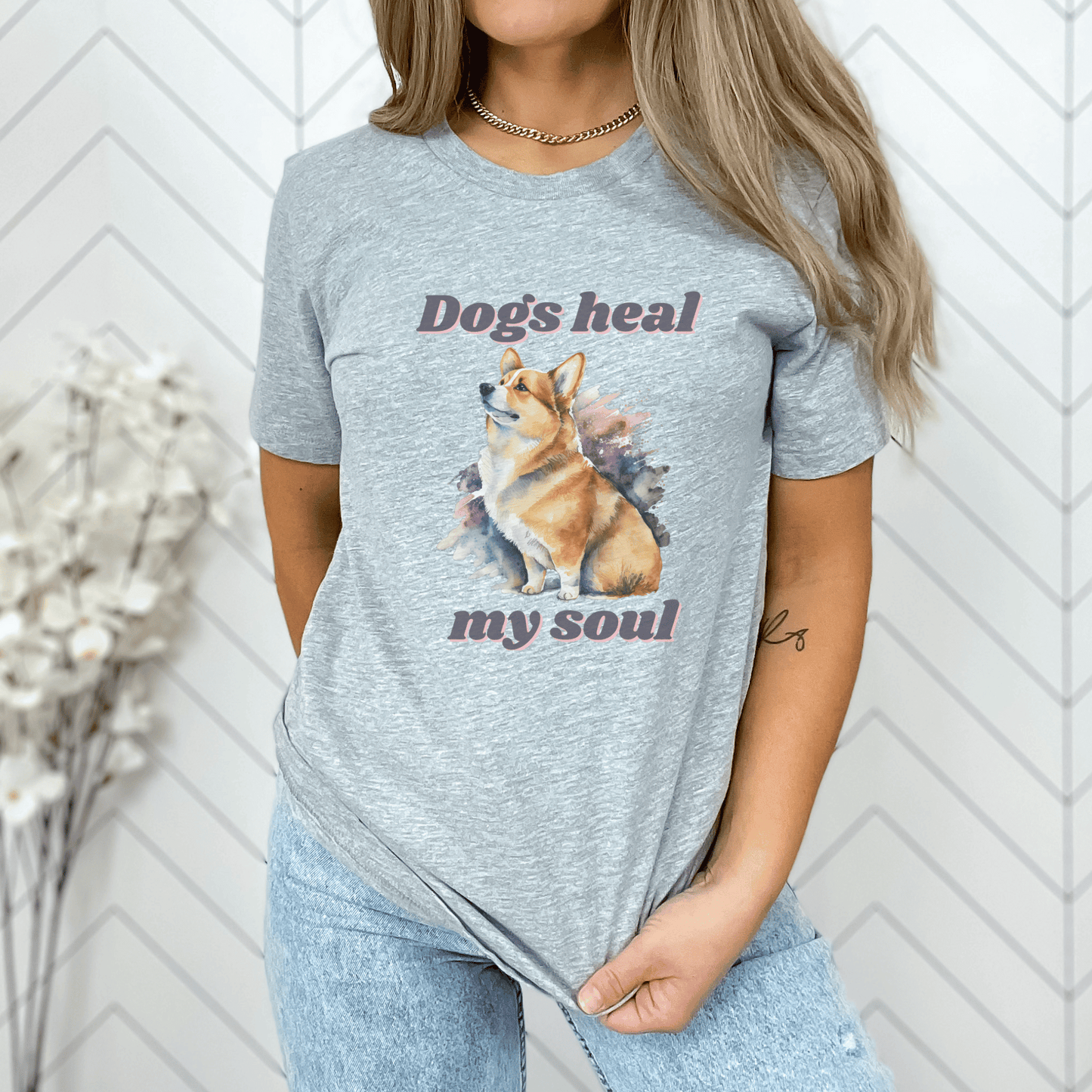 The "Dogs Heal My Soul" t-shirt features a cute corgi dog design, making it a perfect gift for any dog Momma who loves corgis. It is a unique and thoughtful gift that is sure to be appreciated.