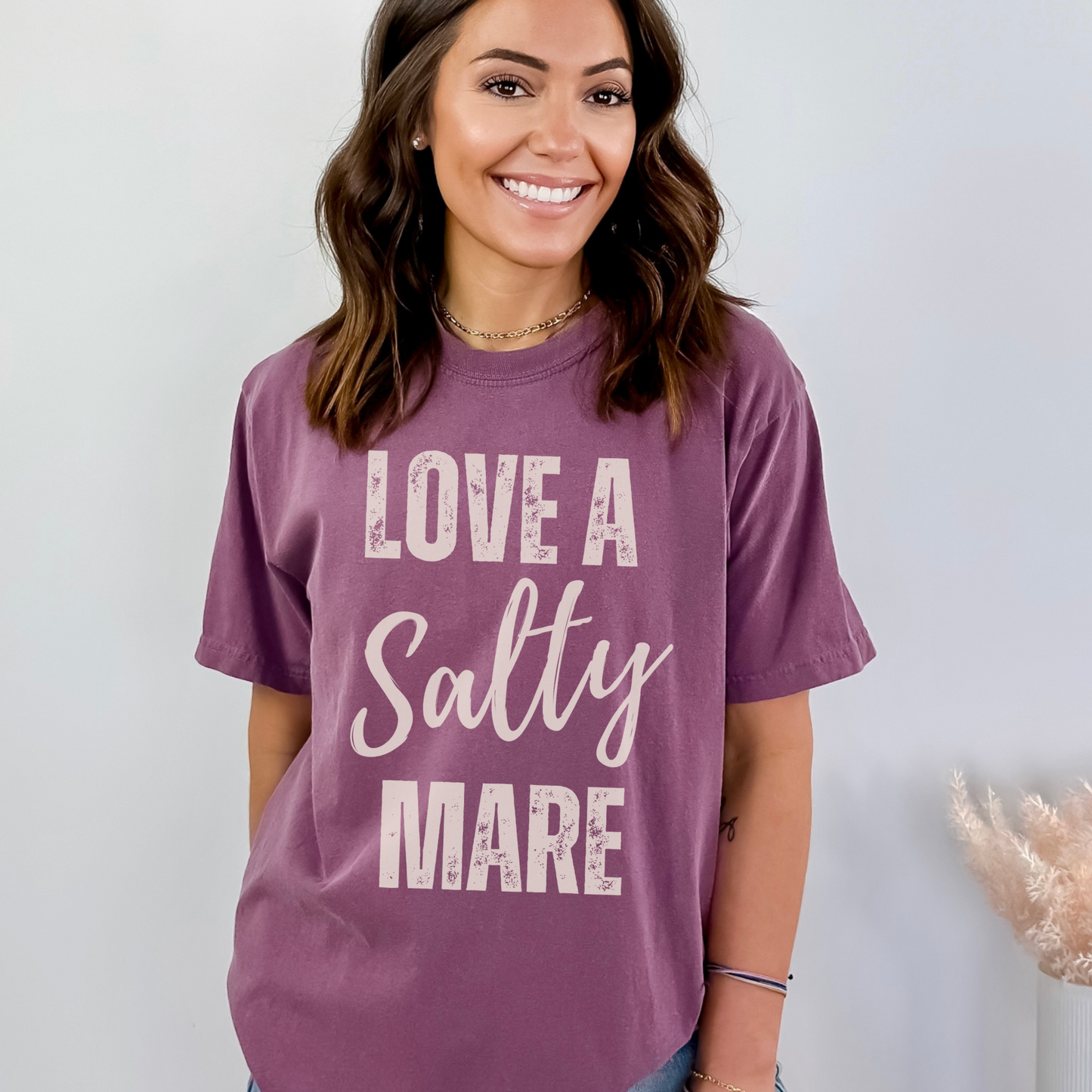 graphic tee with the saying love a salty Mare in a vintage font printed on a comfort colors tee.