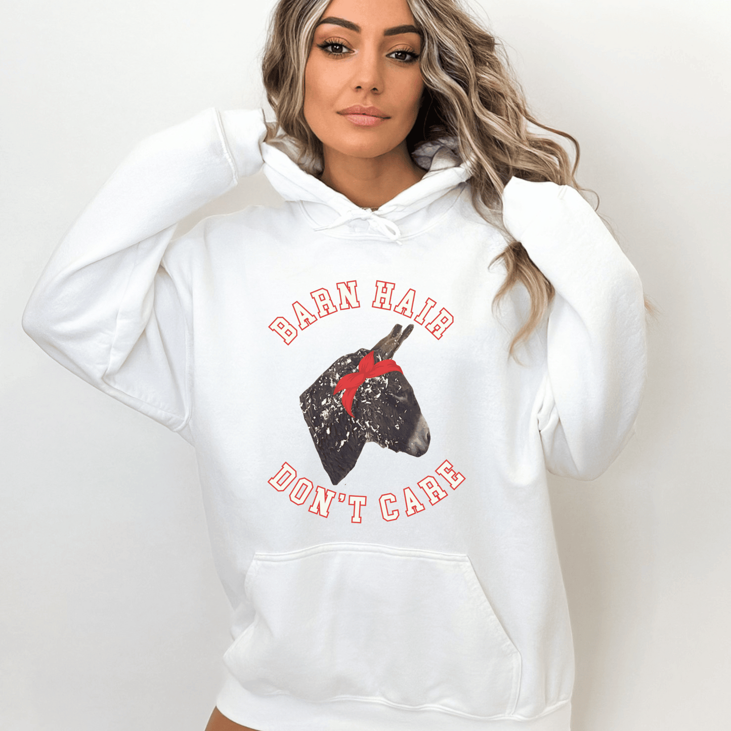 Cute Donkey covered in shavings hoodie! Perfect for horse and donkey lovers alike, this cozy hoodie features a charming Donkey design surrounded by wood shavings, alongside the empowering message Barn Hair, don't care.