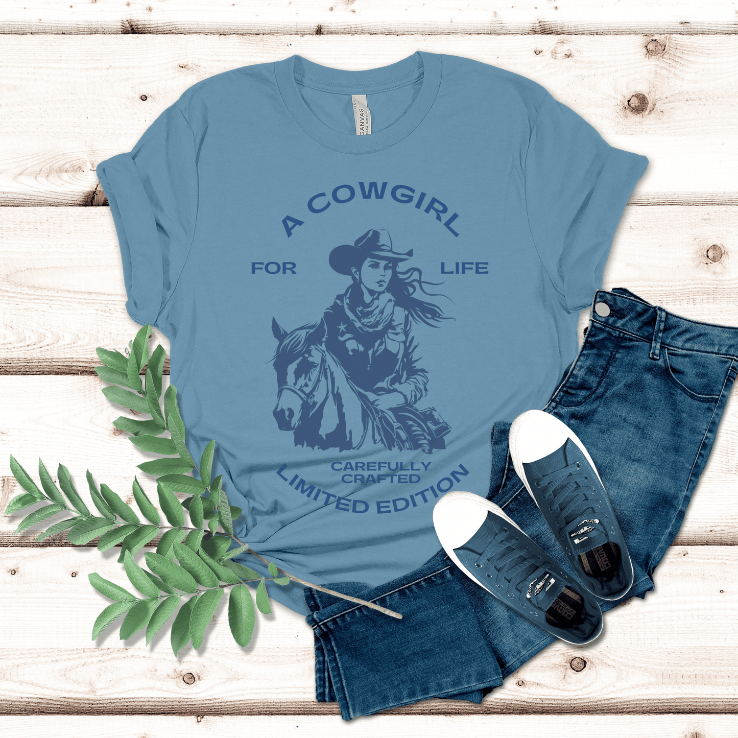 versatile tee features a bold and empowering statement that showcases your love for the cowgirl lifestyle. Whether you're out on the ranch, riding your favorite horse, or simply rocking a casual yet chic look, this t-shirt is a must-have addition to your wardrobe