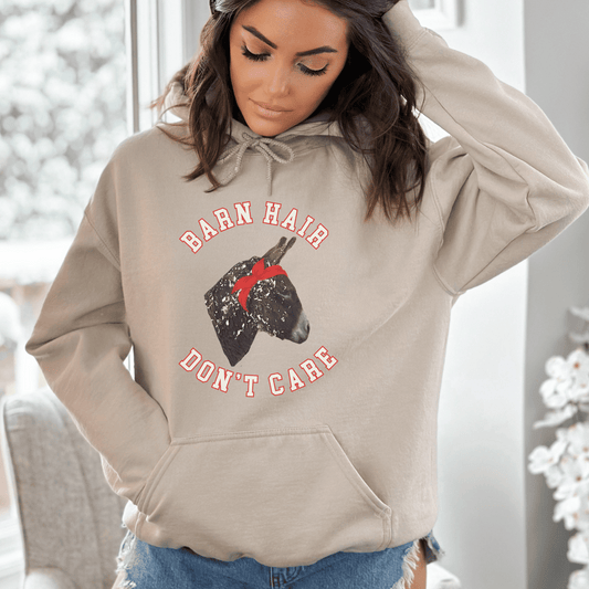 Cute Donkey covered in shavings hoodie! Perfect for horse and donkey lovers alike, this cozy hoodie features a charming Donkey design surrounded by wood shavings, alongside the empowering message Barn Hair, don't care.