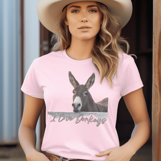 Cute Donkey looking over the fence with I love  dokeys printed below it on a crew neck t-shirt