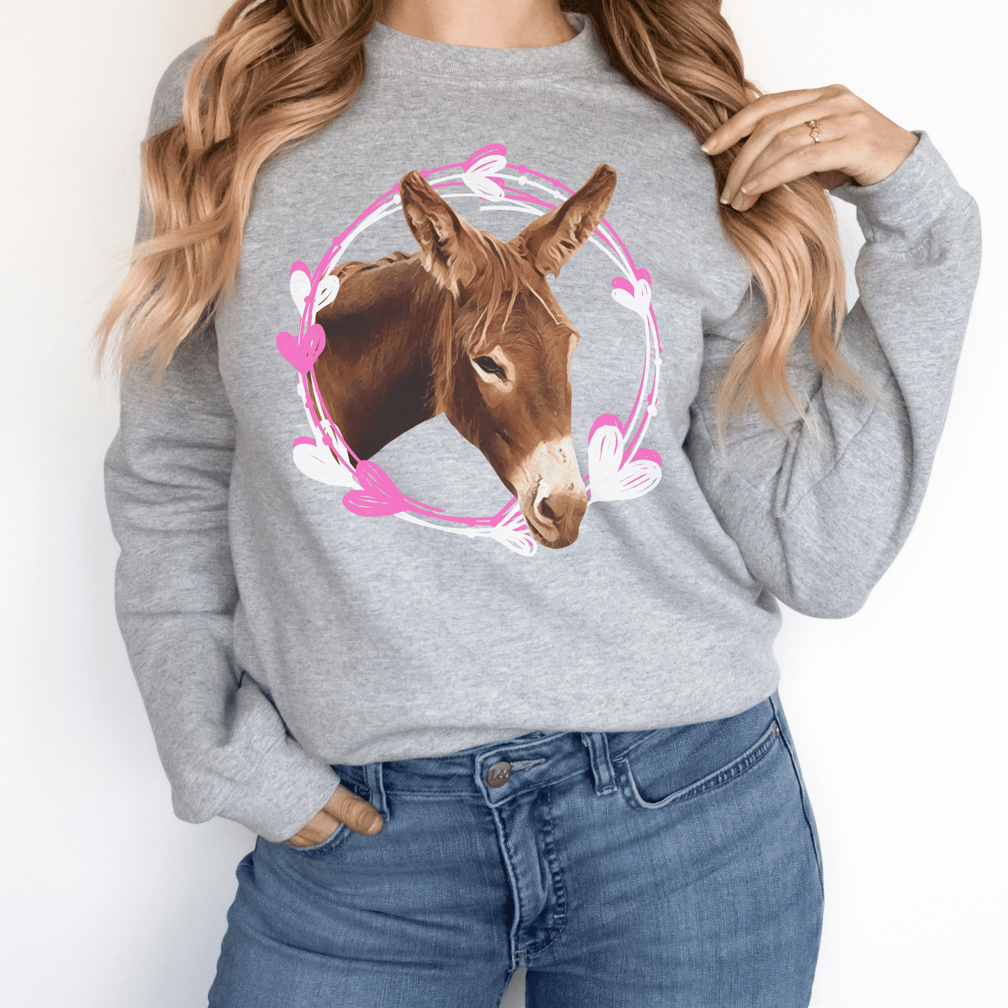 Adorable Donkey heart wreath crew neck, designed to showcase your love for donkeys! Whether you want to express your affection for these gentle creatures, this cute and cozy sweatshirt is the perfect choice. Crafted with the soft materials, you'll love how snugly warm and comfortable it feels against your skin