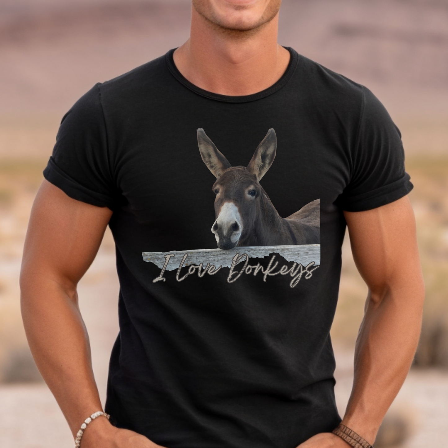 Cute Donkey looking over the fence with I love dokeys printed below it on a crew neck t-shirt