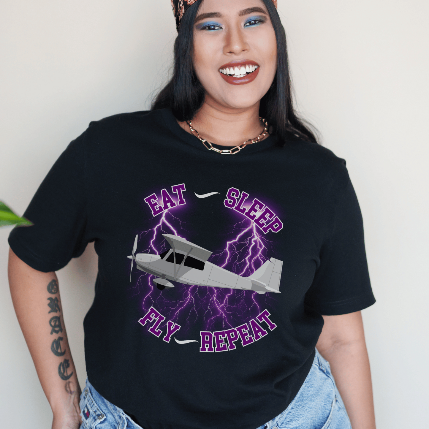 T-shirt, perfect for aviation enthusiasts and those who have a passion for flying with the saying Eat, sleep Fly repeat.