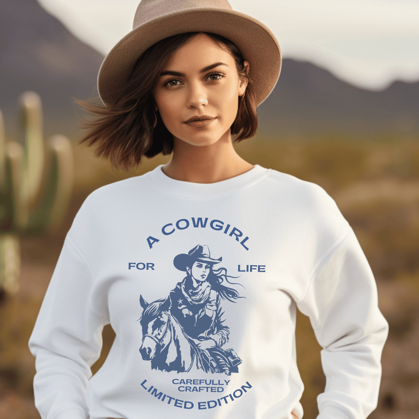 versatile sweatshirt features a bold and empowering statement that showcases your love for the cowgirl lifestyle. Whether you're out on the ranch, riding your favorite horse, or simply rocking a casual yet chic look, this sweatshirt is a must-have addition to your wardrobe.