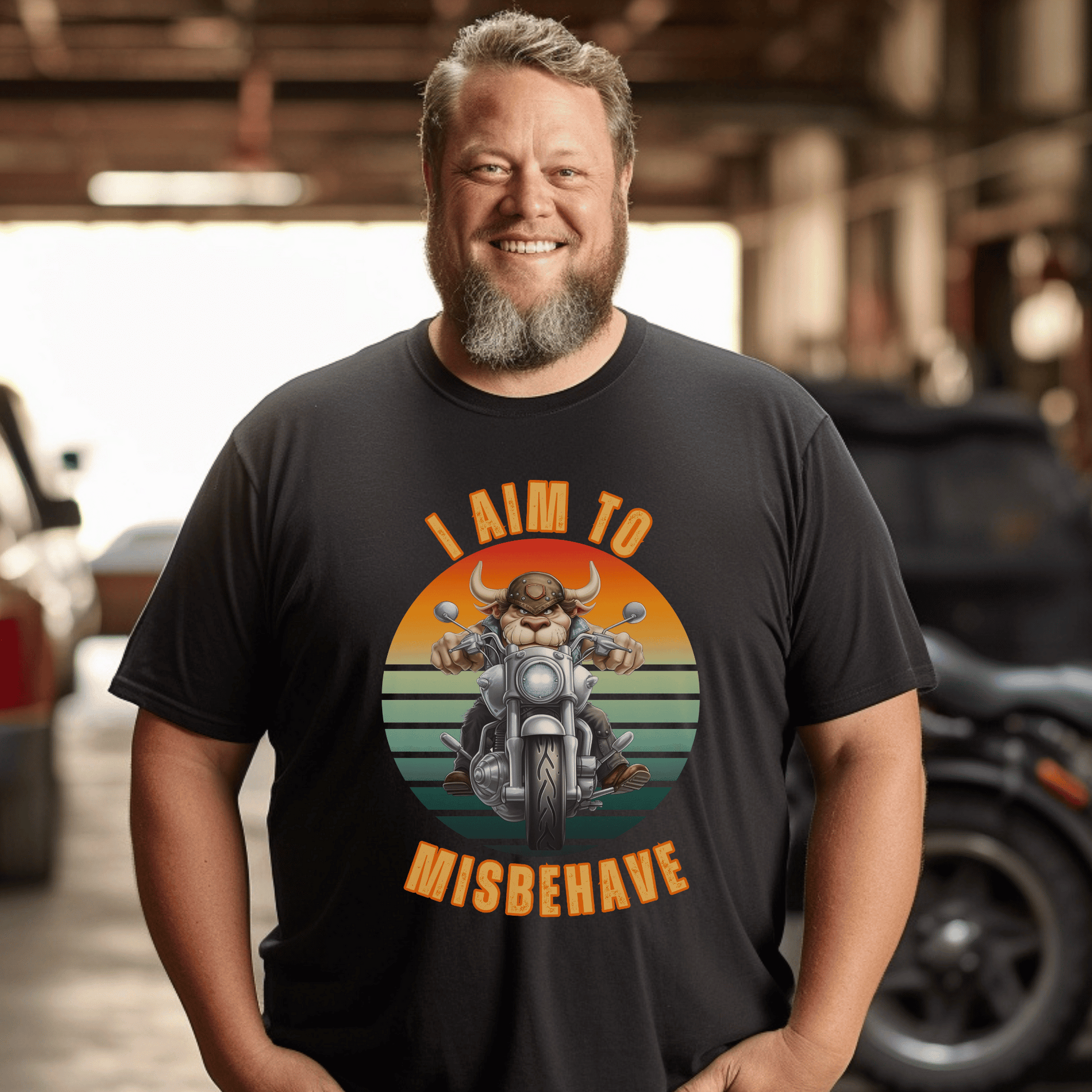 Funny tee with a bull that is riding a motorcycle with a vintage scene and text that says I aim to misbehave ptinted on a round neck t-shirt.