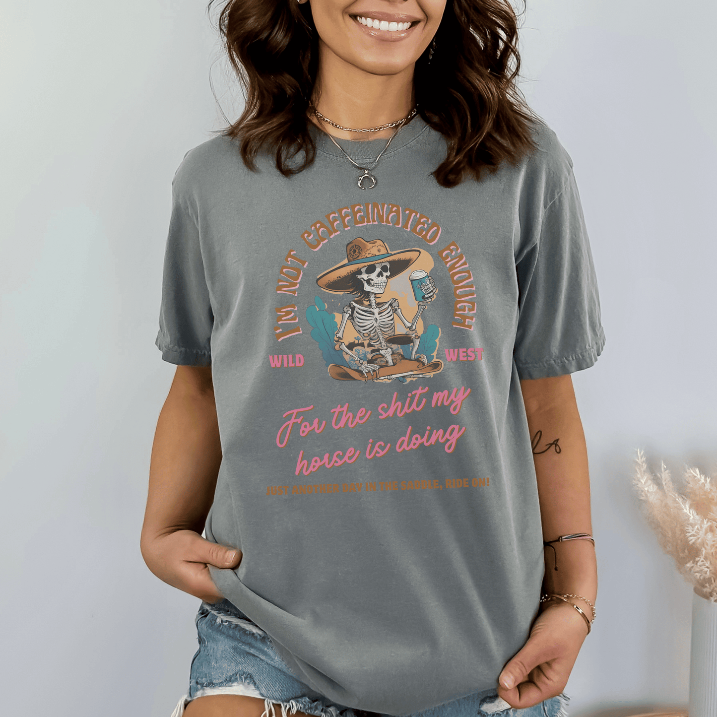 This hilarious t-shirt featuring a western skeleton and the cheeky phrase I'm not caffeinated enough for the shit my horse is doing.Perfect for equestrians and horse lovers who appreciate a good laugh.