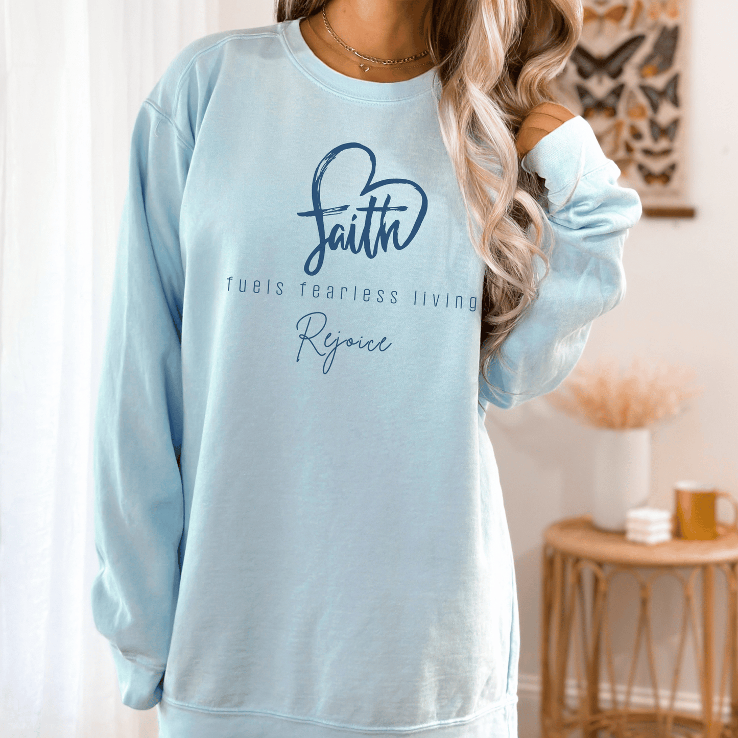 Faith Fuels Fearless living Christian Saying on a Comfort Colors Crew neck sweatshirt.