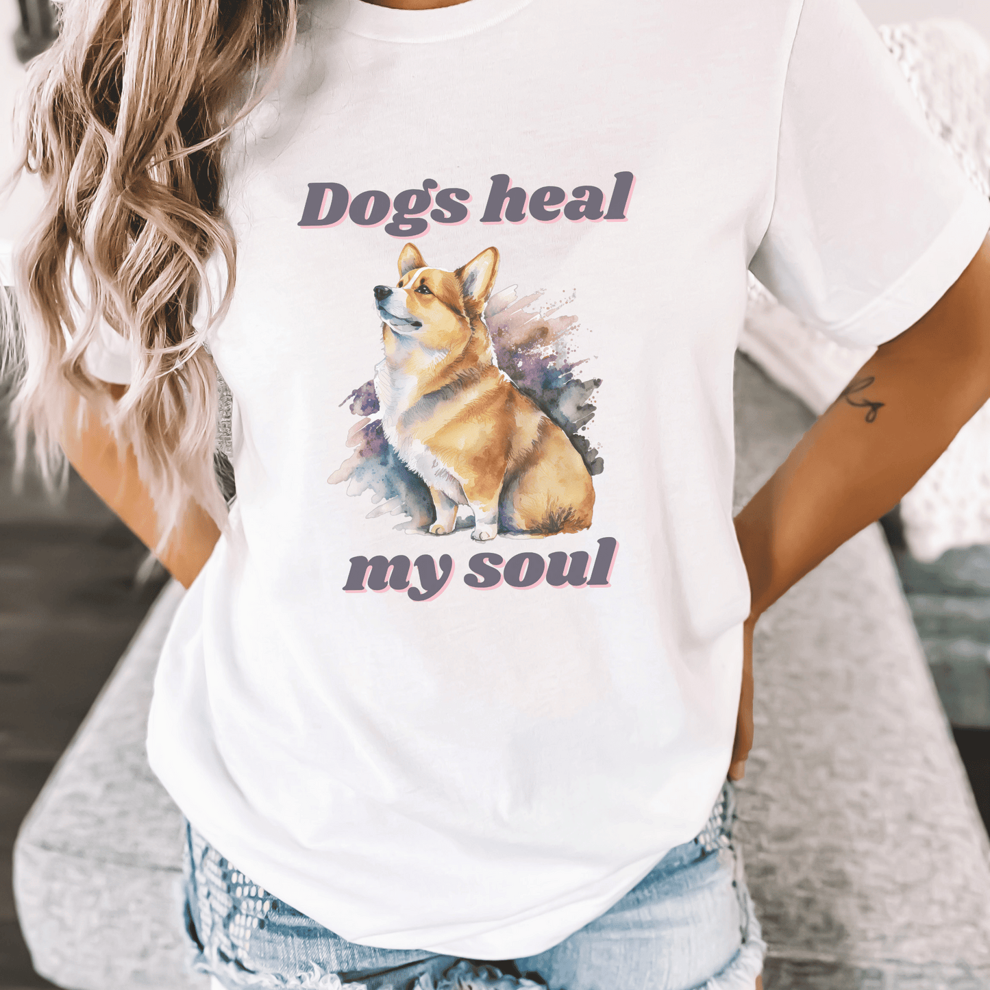 The "Dogs Heal My Soul" t-shirt features a cute corgi dog design, making it a perfect gift for any dog Momma who loves corgis. It is a unique and thoughtful gift that is sure to be appreciated.