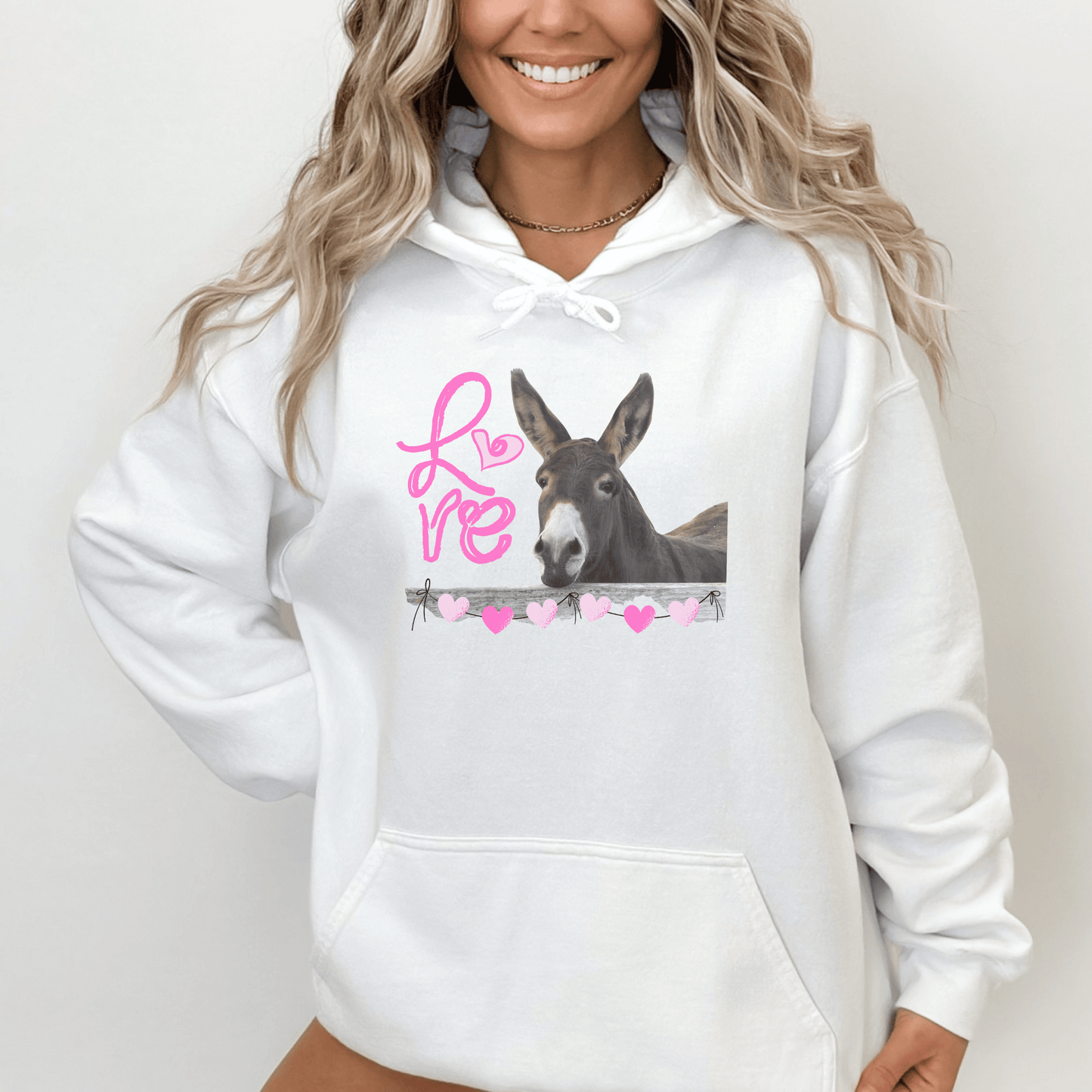 Donkey love cozy go-to hoodie to curl up in for Valentines Day our Cute animal Love themed design is so that's soft, smooth, and stylish