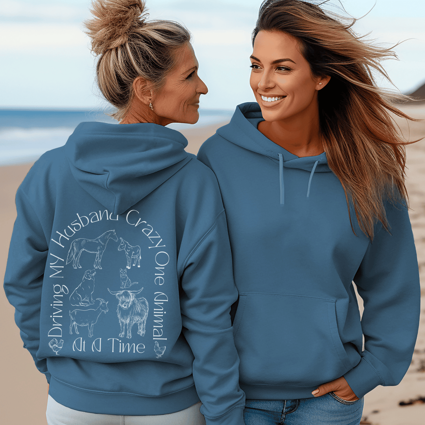 Hoodie with the saying Driving My Husband Crazy one Animal at a time on the back  with a silhouette of a horse, donkey, dog , cat, goat, cow and chickens, same design on the front but smaller.