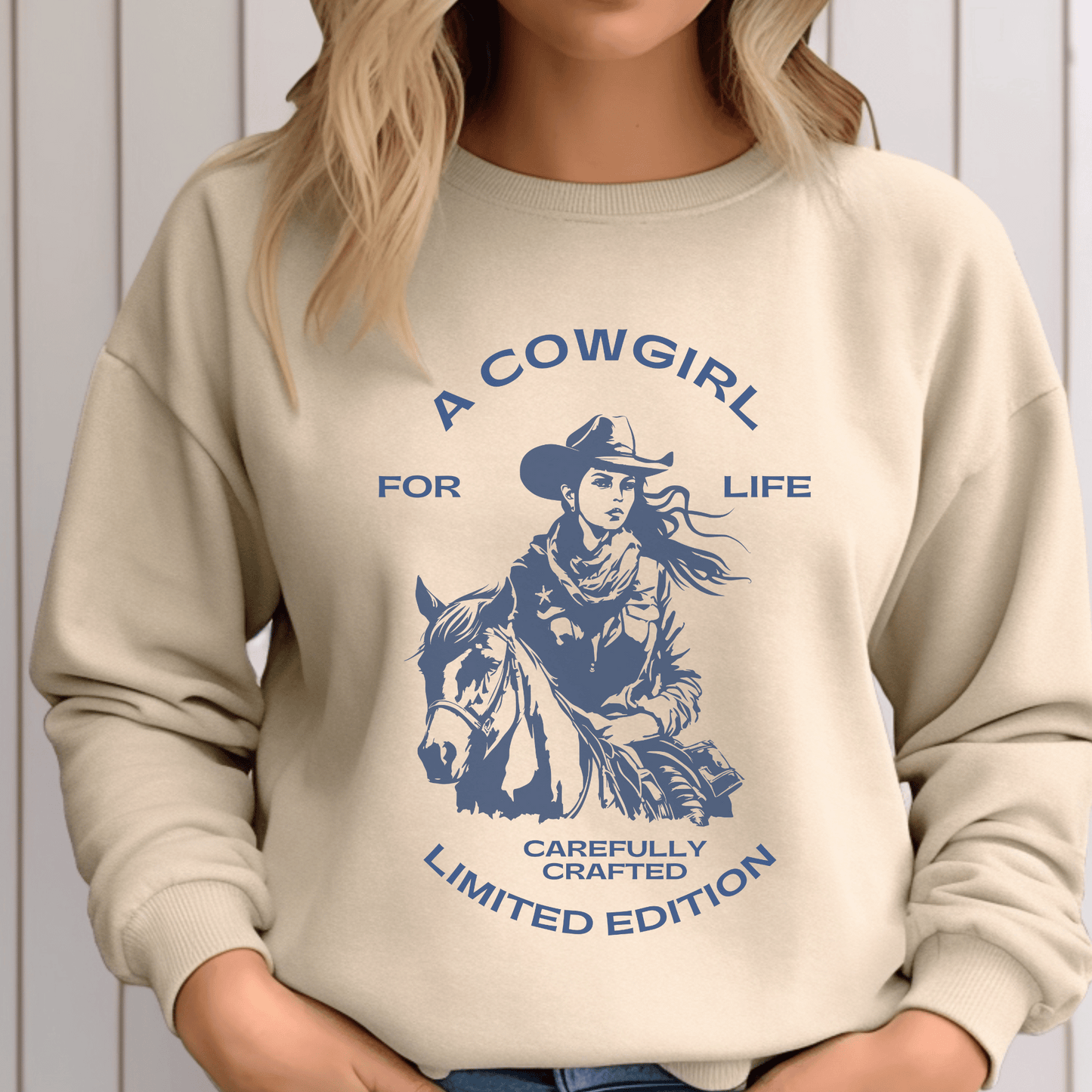 versatile sweatshirt features a bold and empowering statement that showcases your love for the cowgirl lifestyle. Whether you're out on the ranch, riding your favorite horse, or simply rocking a casual yet chic look, this sweatshirt is a must-have addition to your wardrobe.