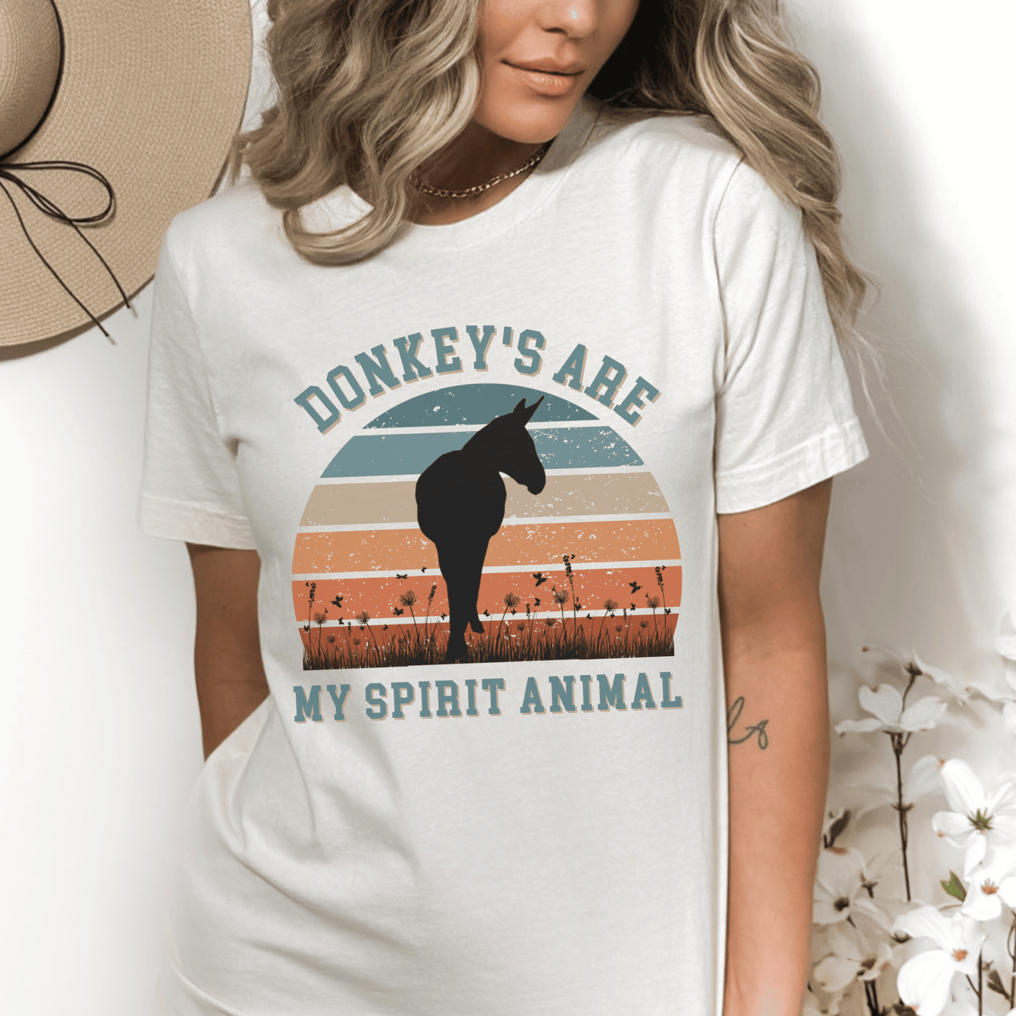 This unique piece features a charming donkey illustration on the front, perfectly capturing the spirit and beauty of these lovable creatures. The saying Donkeys are my spirit animal adds a touch of whimsy and showcases your love for these incredible animals.