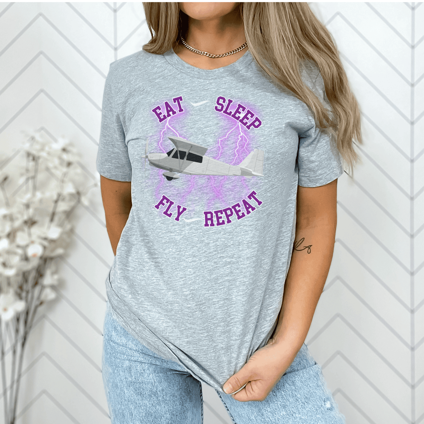 T-shirt, perfect for aviation enthusiasts and those who have a passion for flying with the saying Eat, sleep Fly repeat.