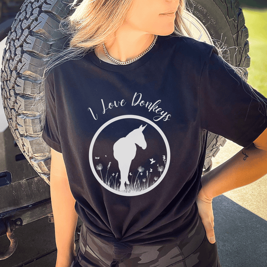 I love donkeys t-shirt is perfect for going anywhere or hanging out with your donkeys. This trend setting donkey design will make a great addition to your wardrobe and a unique gift for that special donkey loving person in your life. Everyone needs the perfect t-shirt to complement an everyday, laid-back look. The ideal top for so many occasions, this lightweight cotton tee will keep you comfy and looking smart.