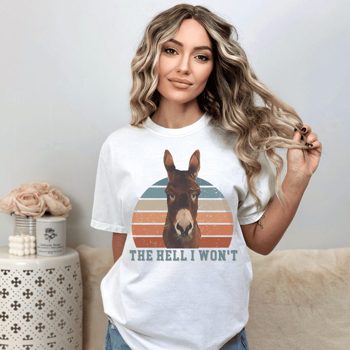  Cute Donkey t-shirt, designed for those who love a touch of sass! Featuring the saying Hell I won't below a sassy donkey, this shirt is perfect for expressing your bold and confident personality. Made from premium quality materials, this t-shirt is not only stylish but also comfortable to wear.