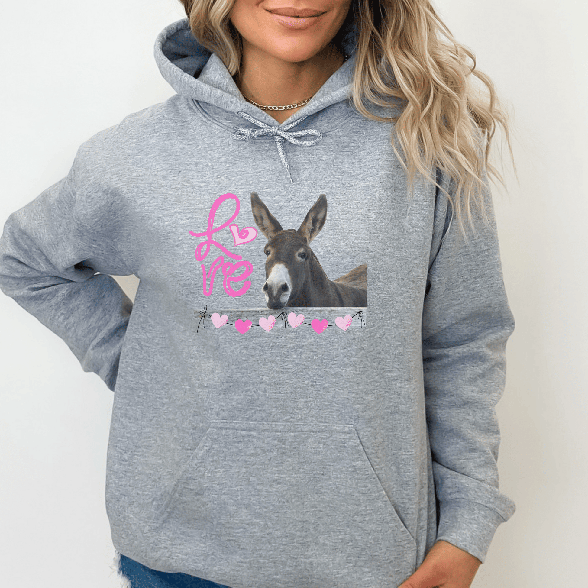 Donkey love cozy go-to hoodie to curl up in for Valentines Day our Cute animal Love themed design is so that's soft, smooth, and stylish