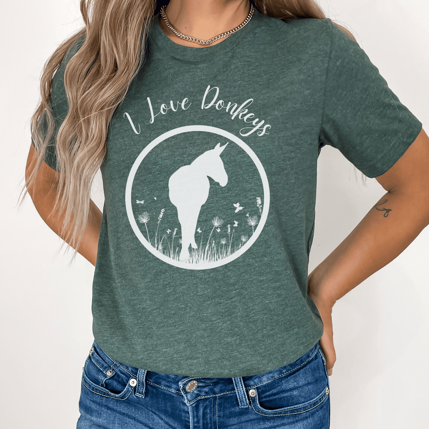 I love donkeys t-shirt is perfect for going anywhere or hanging out with your donkeys. This trend setting donkey design will make a great addition to your wardrobe and a unique gift for that special donkey loving person in your life. Everyone needs the perfect t-shirt to complement an everyday, laid-back look. The ideal top for so many occasions, this lightweight cotton tee will keep you comfy and looking smart.