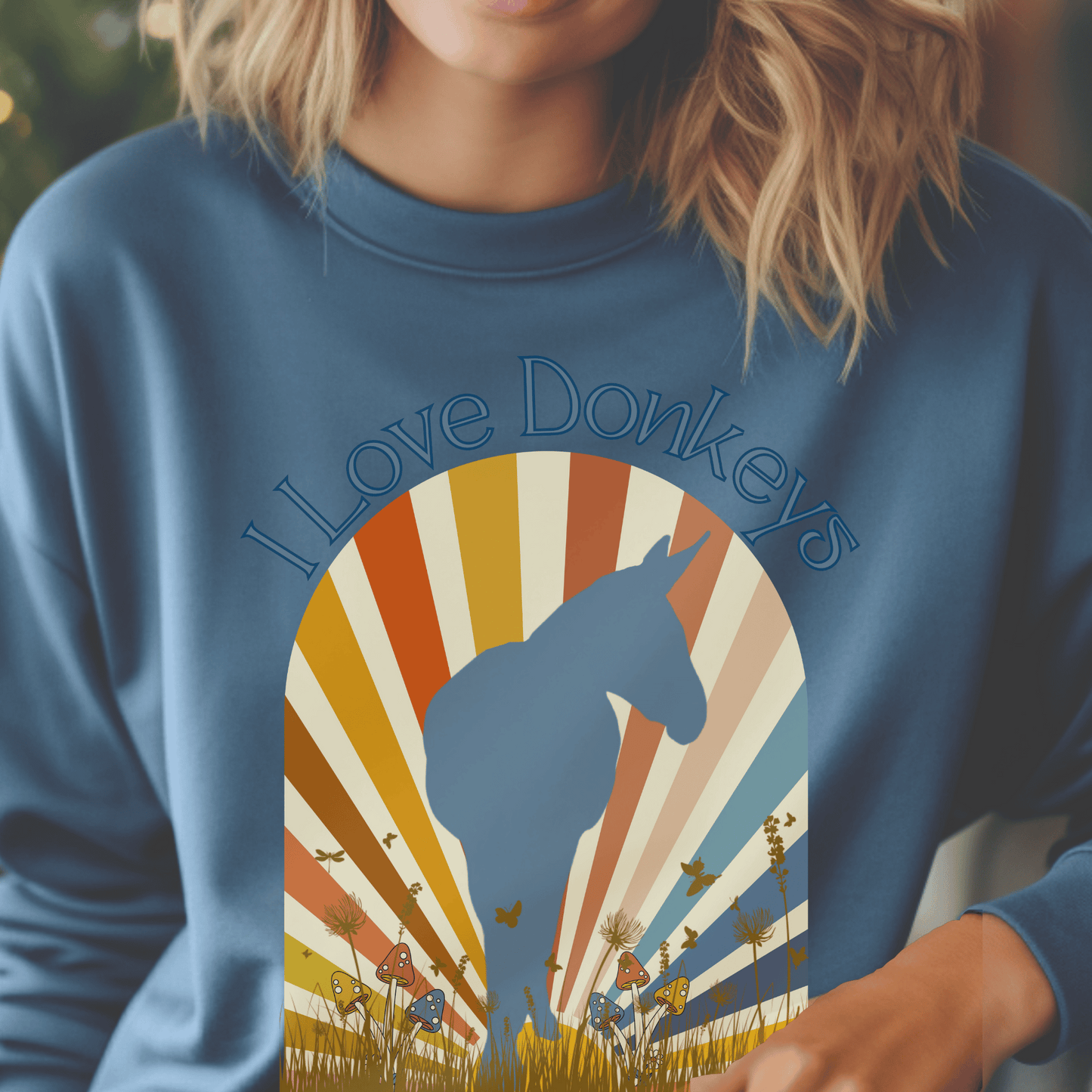 Crew Neck sweatshirt with vintage sun-rays design with a captivating donkey silhouette. Crafted with love and care, it boasts a perfect blend of softness and warmth, ensuring that you stay comfortable during chilly days.