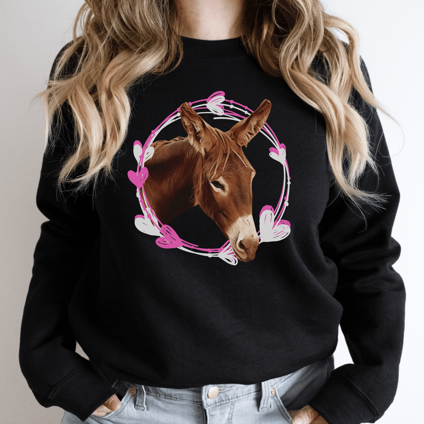 Adorable Donkey heart wreath crew neck, designed to showcase your love for donkeys! Whether you want to express your affection for these gentle creatures, this cute and cozy sweatshirt is the perfect choice. Crafted with the soft materials, you'll love how snugly warm and comfortable it feels against your skin