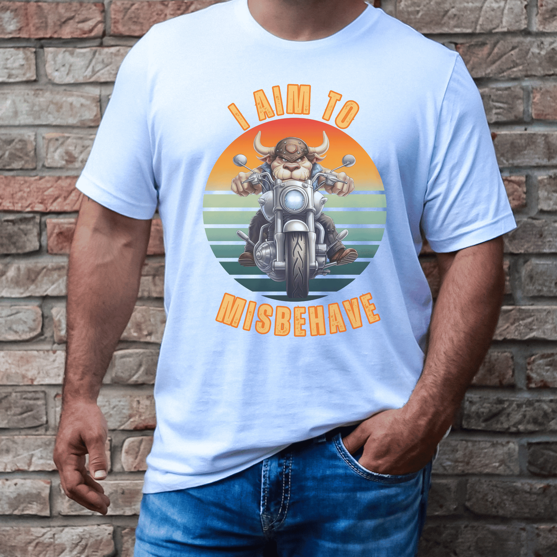 Funny tee with a bull that is riding a motorcycle with a vintage scene and text that says I aim to misbehave ptinted on a round neck t-shirt.