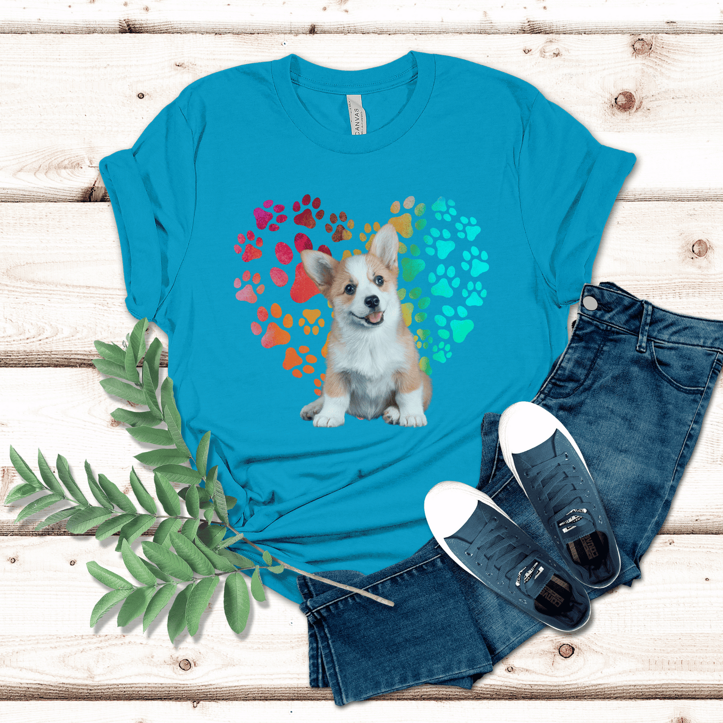 This Corgi Dog t-shirt features a paw print heart in the background, making it a unique and thoughtful gift for dog lovers, pet owners, and Corgi moms. The shirt is perfect for anyone who wants to show off their love for their furry friend.