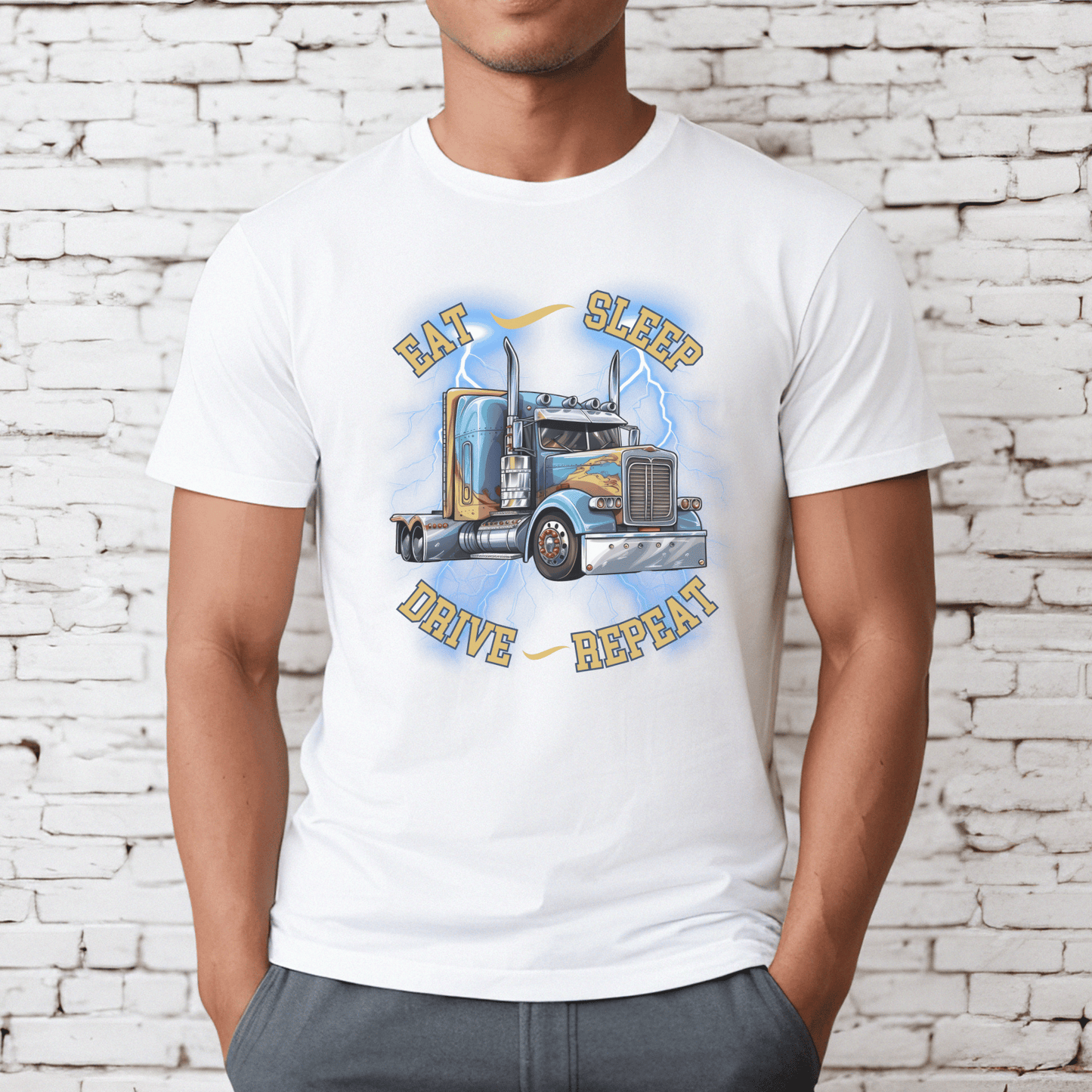  high-quality t-shirt featuring a bold semi-truck design that exudes an adventurous spirit. The eye-catching phrase eat, sleep, drive, repeat adds a touch of charm and character to this classic piece. 