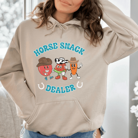 Cute Retro Character Horse Snack Dealer Hoodie! This quirky and adorable hoodie will surely capture everyone's attention with its unique design. Made from high-quality materials, it is not only comfortable to wear but also durable for everyday use. The retro character horse design adds a touch of nostalgia, while the snack dealer inscription adds a playful twist. 