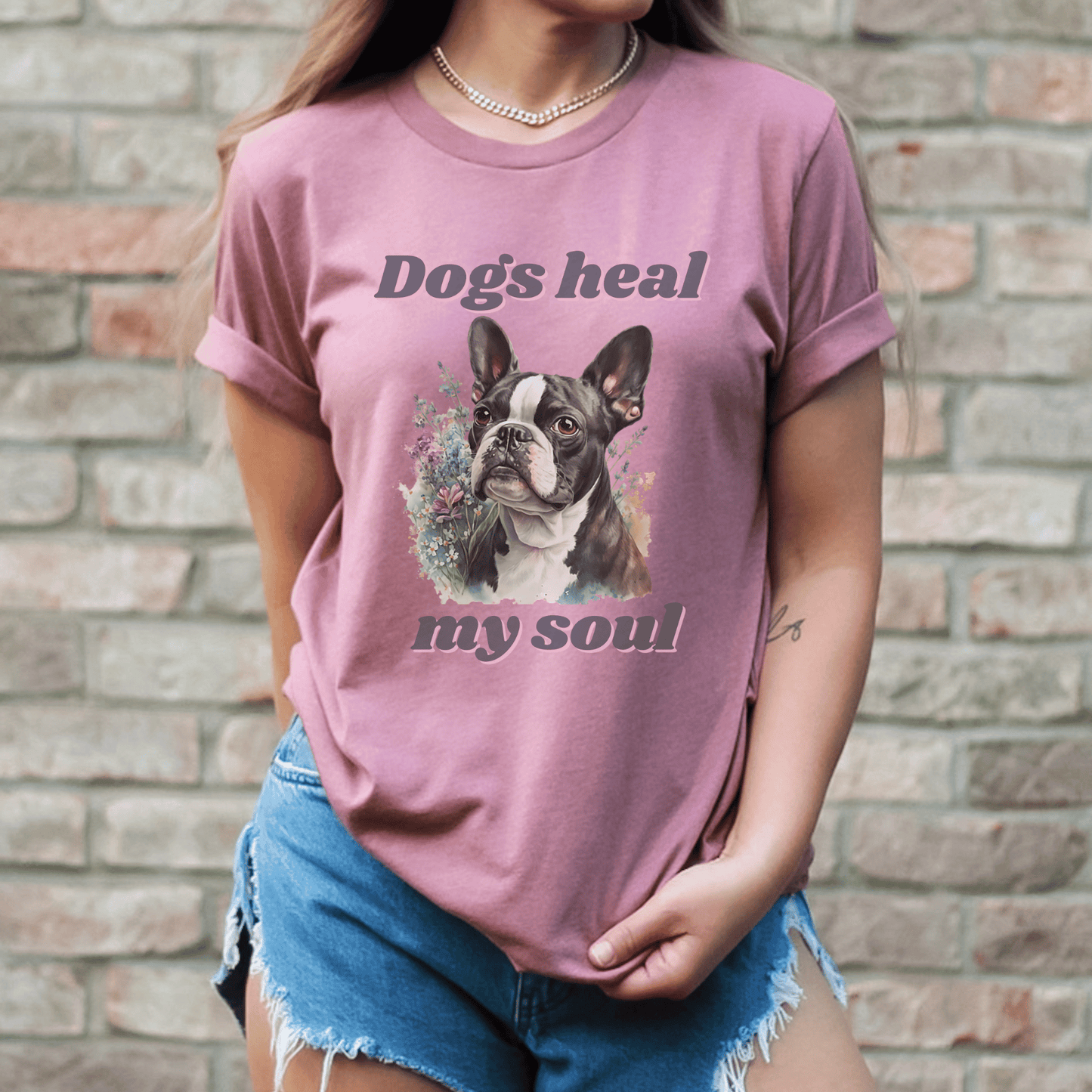 The " Dogs Heal My Soul" t-shirt features a cute Boston Terrier dog design, making it a perfect gift for any dog Momma who loves Boston Terriers. It is a unique and thoughtful gift that is sure to be appreciated.