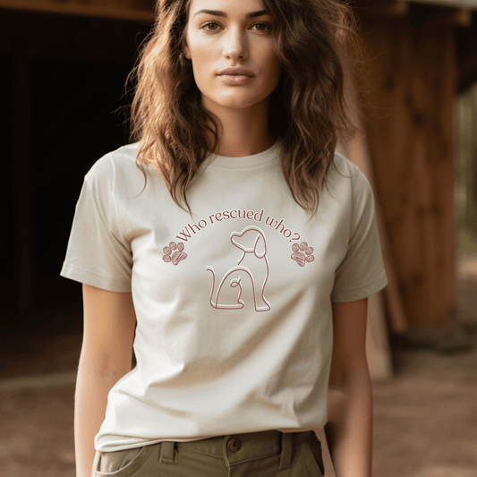 High quality crew neck t-shirt with the saying Who rescued who and an outline of a dog.