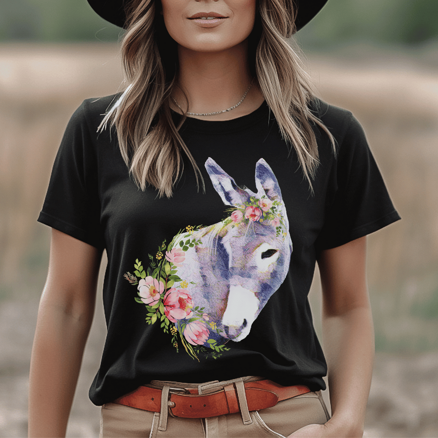 A pastel  donkey and flowers design on a crew neck t-shirt.