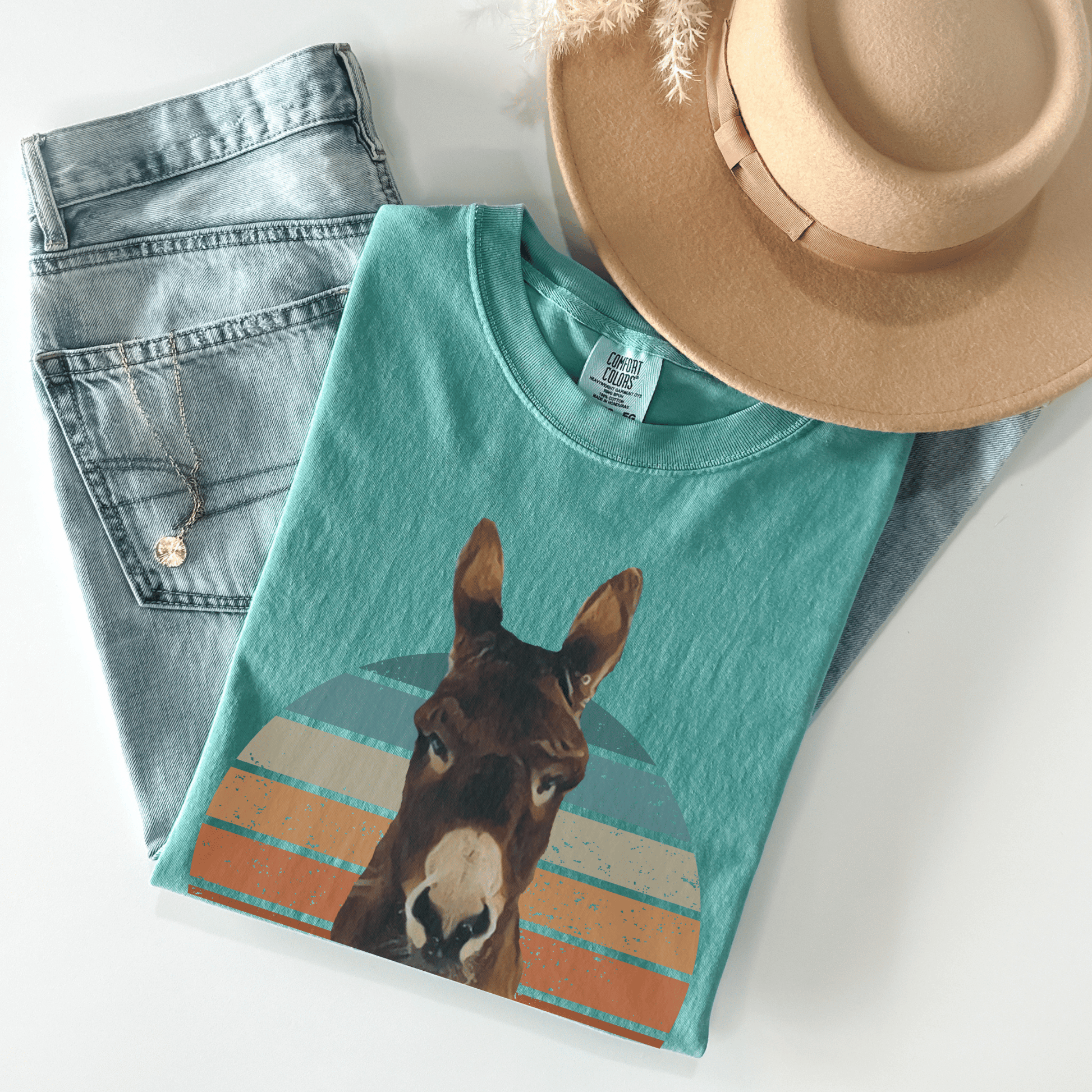  Cute Donkey t-shirt, designed for those who love a touch of sass! Featuring the saying Hell I won't below a sassy donkey, this shirt is perfect for expressing your bold and confident personality. Made from premium quality materials, this t-shirt is not only stylish but also comfortable to wear.