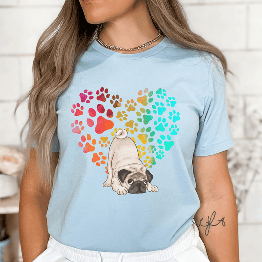 This Pug Dog t-shirt features a paw print heart in the background, making it a unique and thoughtful gift for dog lovers, pet owners, and Pug moms. The shirt is perfect for anyone who wants to show off their love for their furry friend.