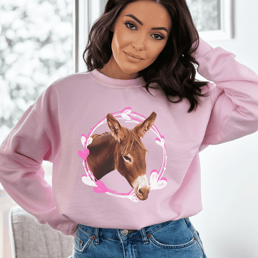 Adorable Donkey heart wreath crew neck, designed to showcase your love for donkeys! Whether you want to express your affection for these gentle creatures, this cute and cozy sweatshirt is the perfect choice. Crafted with the soft materials, you'll love how snugly warm and comfortable it feels against your skin