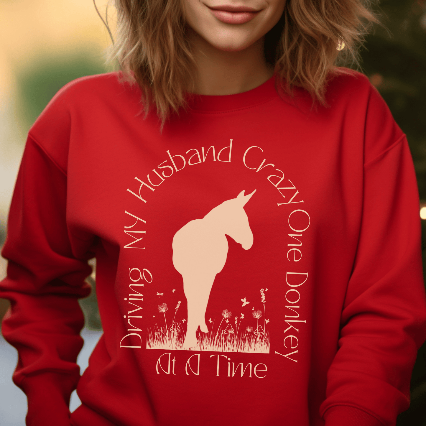 Driving My Husband Crazy One Donkey at a Time Crew Neck Sweatshirt! Show off your playful side with this fun and whimsical design that is bound to turn heads. Crafted with a premium quality blend of fabrics, this sweatshirt ensures maximum comfort and durability.