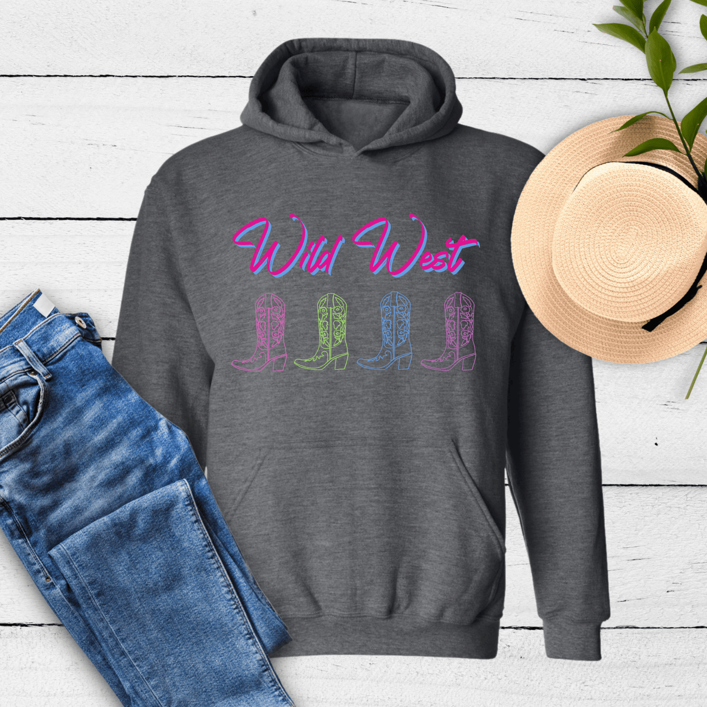 Wild West Neon Cowboy Boot Hoodie, the perfect blend of Western charm and vibrant style! This hoodie showcases a bold neon cowboy boot design that is sure to turn heads wherever you go.