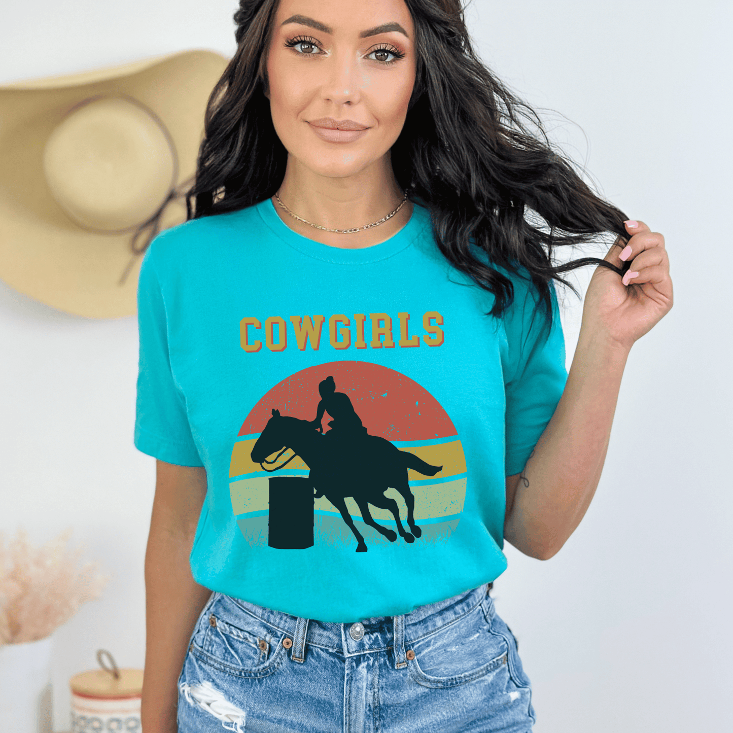 This exceptional piece features a captivating illustration of a lady fearlessly racing through barrels, showcasing her true cowgirl spirit. With the word cowgirls elegantly displayed above the scene, this artwork perfectly encapsulates the fierce and determined energy of these empowered women. Whether you're a fan of rodeos, Western culture, or simply appreciate unique vintage design