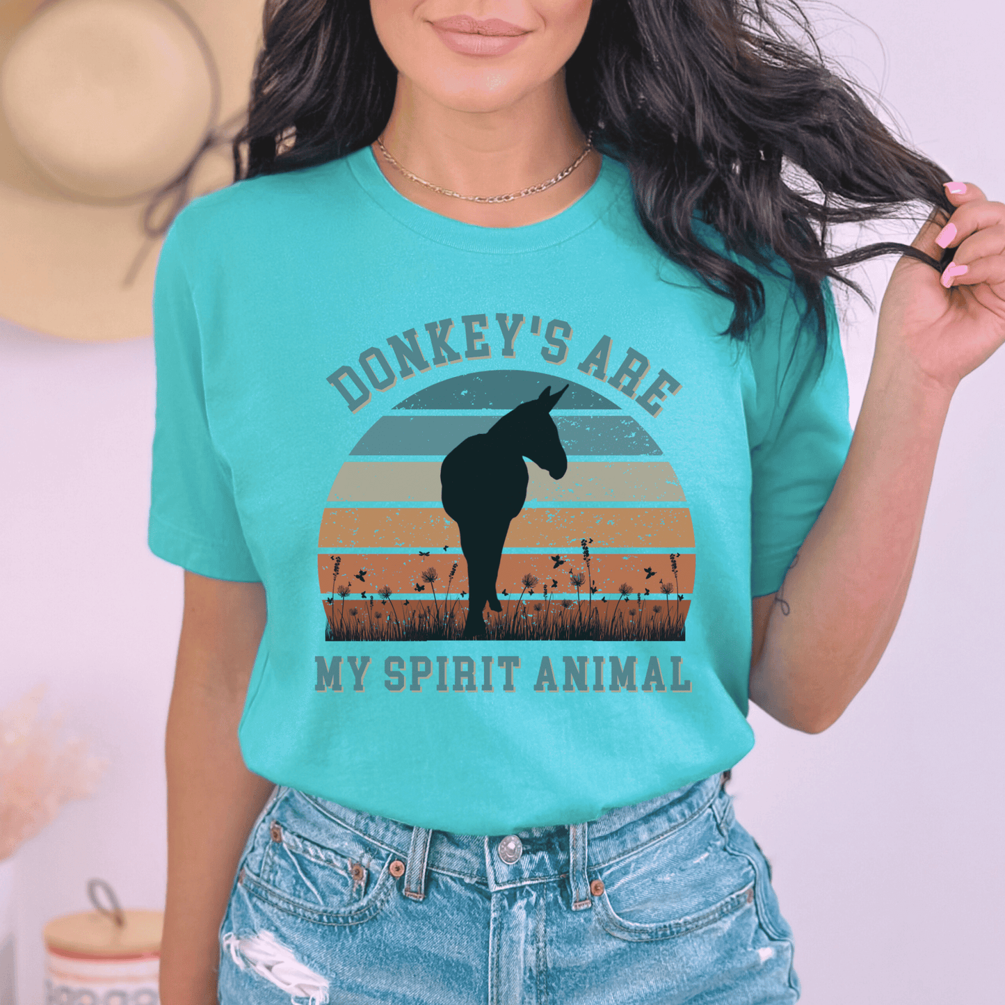 This unique piece features a charming donkey illustration on the front, perfectly capturing the spirit and beauty of these lovable creatures. The saying Donkeys are my spirit animal adds a touch of whimsy and showcases your love for these incredible animals.