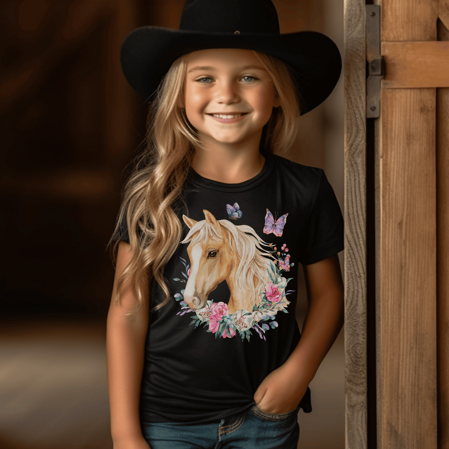  charming Youth T-Shirt adorned with a breathtaking Palomino horse, delicate floral motifs, and enchanting butterfly design.&nbsp; This fashion-forward tee will make your little one feel as graceful as a butterfly and as elegant as a Palomino horse. 