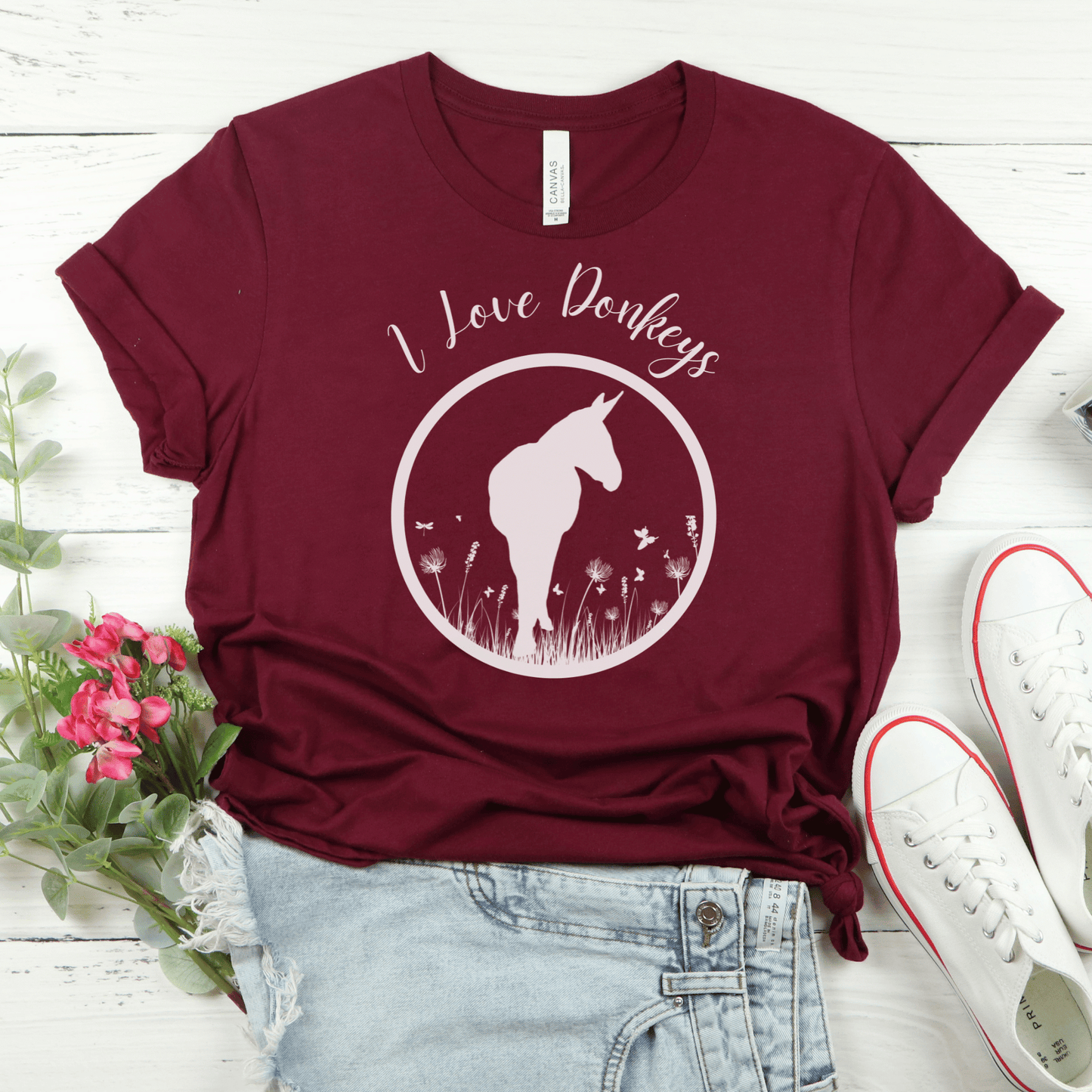 I love donkeys t-shirt is perfect for going anywhere or hanging out with your donkeys. This trend setting donkey design will make a great addition to your wardrobe and a unique gift for that special donkey loving person in your life. Everyone needs the perfect t-shirt to complement an everyday, laid-back look. The ideal top for so many occasions, this lightweight cotton tee will keep you comfy and looking smart.