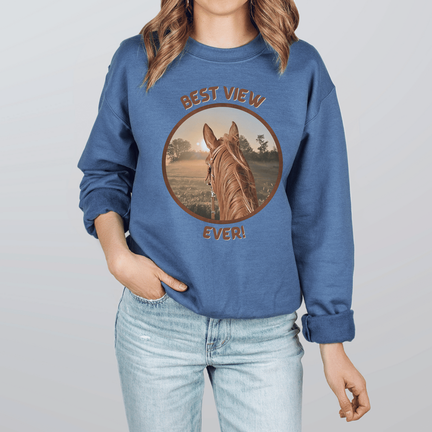 Best View Ever saying with a chestnut horse looking at the sunrise On a crew neck sweatshirt.