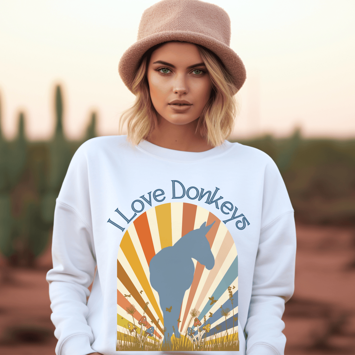 Crew neck sweatshirt with vintage sun-rays design with a captivating donkey silhouette. Crafted with love and care, it boasts a perfect blend of softness and warmth, ensuring that you stay comfortable during chilly days.