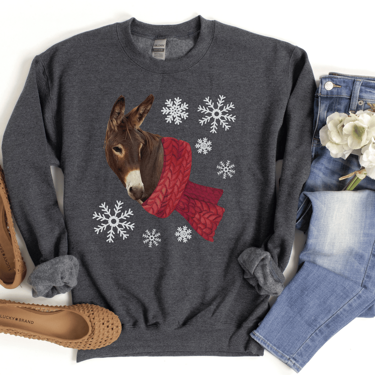 Winter Donkey shirt! This crew neck sweatshirt is perfect for any donkey lover out there. Made with soft and warm materials, it will keep you snug and comfortable all day long. 