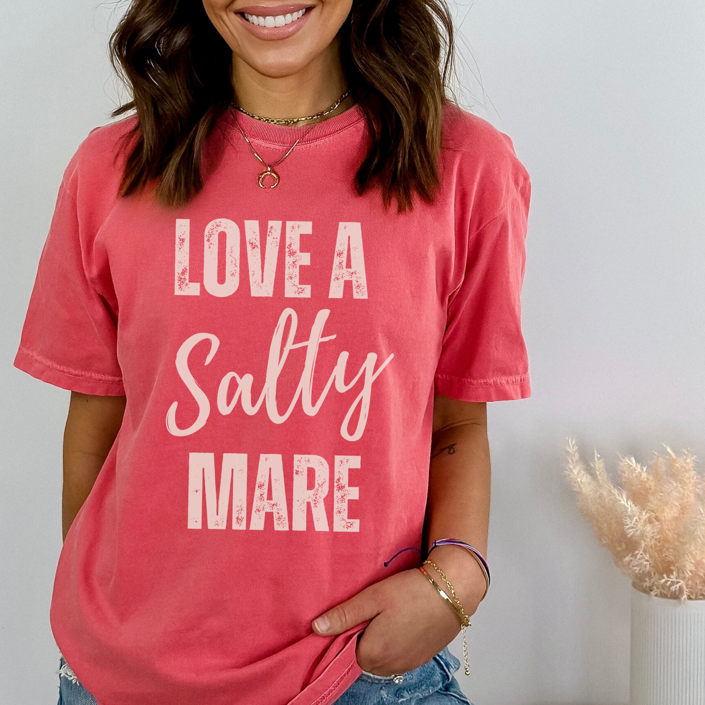 graphic tee with the saying love a salty Mare in a vintage font printed on a comfort colors tee.