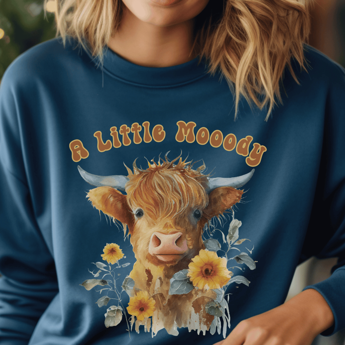  sweatshirt featuring a little moody saying, perfectly complemented by an adorable Highland cow calf and a radiant arrangement of sunflowers. 