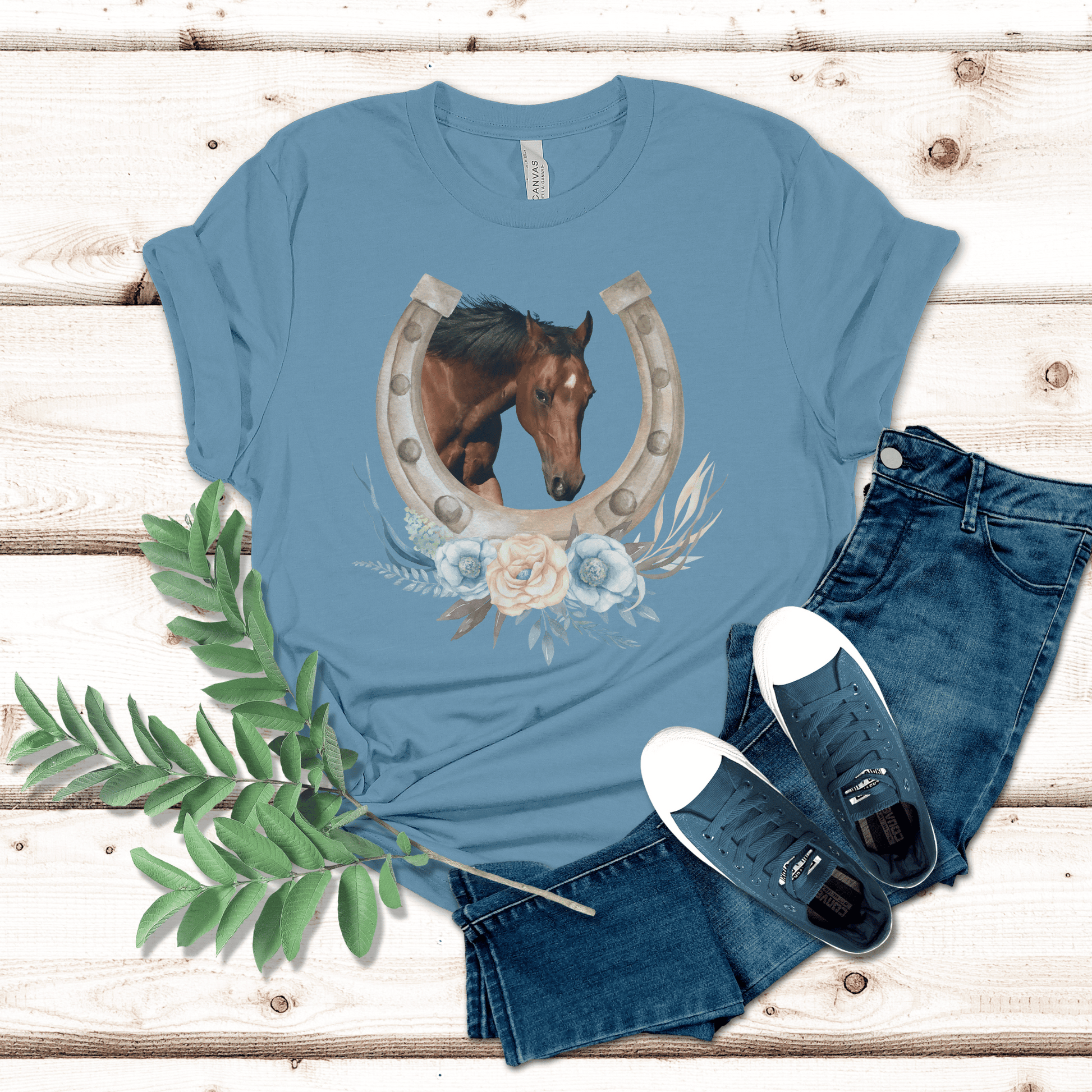 Show your passion for horses with this stylish and chic bay horse t-shirt. Featuring a cute print of a bay horse with a horseshoe and flowers, this is the perfect way to stand out from the crowd. Soft and comfortable, it's an ideal gift for the horse lover 